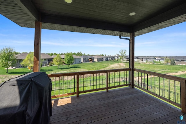2009 S Firestone Ln, Sioux Falls, SD 57110 - deck with a residential view, area for grilling, and a lawn