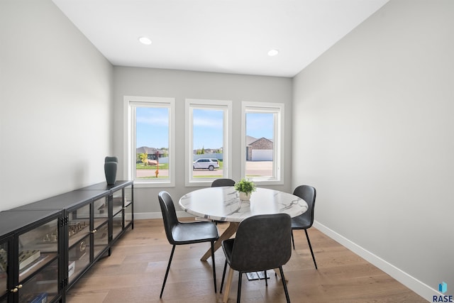 2009 S Firestone Ln, Sioux Falls, SD 57110 - dining room featuring healthy amount of natural light, baseboards, light wood-style floors, and recessed lighting