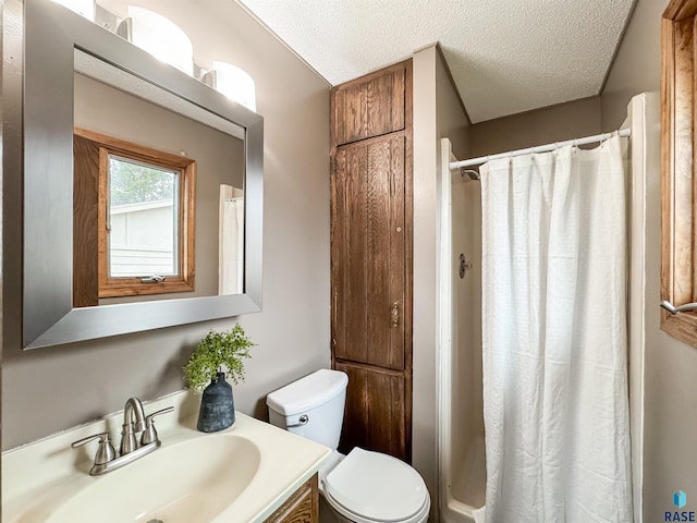 120 S Yellowstone Dr, Brandon, SD 57005 - full bathroom featuring toilet, a textured ceiling, curtained shower, and vanity