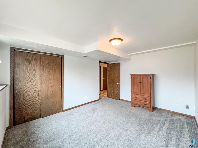 120 S Yellowstone Dr, Brandon, SD 57005 - unfurnished bedroom with baseboards, carpet floors, and a closet