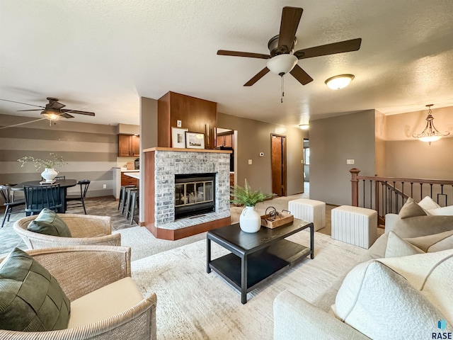 120 S Yellowstone Dr, Brandon, SD 57005 - living room with ceiling fan, a textured ceiling, and light carpet