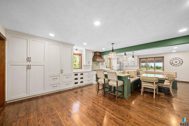 48190 265th St, Brandon, SD 57005 - dining space with dark wood-style floors, recessed lighting, and a textured ceiling