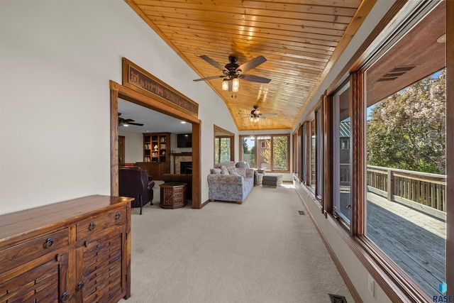 48190 265th St, Brandon, SD 57005 - sunroom featuring carpet flooring, vaulted ceiling, and wood ceiling