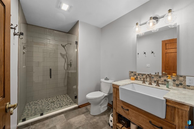 48190 265th St, Brandon, SD 57005 - bathroom with toilet, a shower stall, vanity, and baseboards