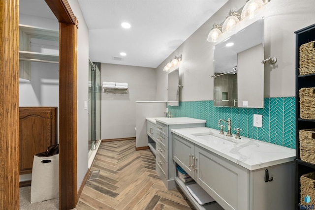 48190 265th St, Brandon, SD 57005 - full bathroom featuring a shower stall, two vanities, and recessed lighting