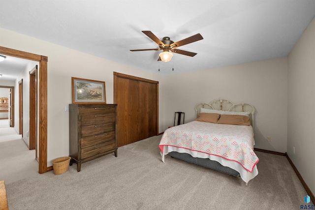 48190 265th St, Brandon, SD 57005 - bedroom with a closet, light colored carpet, and a ceiling fan