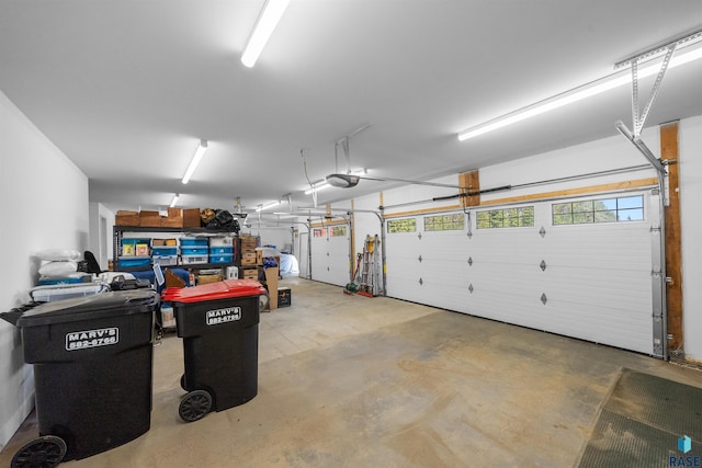48190 265th St, Brandon, SD 57005 - garage featuring a garage door opener
