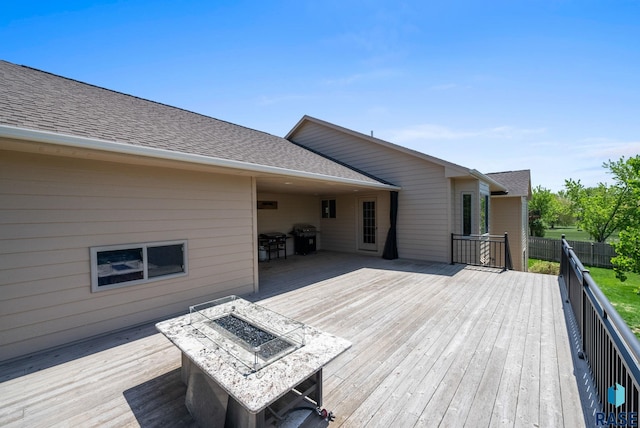 2305 N Ivy Rd, Tea, SD 57064 - wooden deck featuring a fire pit, fence, and area for grilling