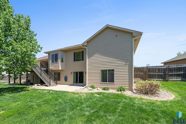2305 N Ivy Rd, Tea, SD 57064 - back of property with stairway and a patio