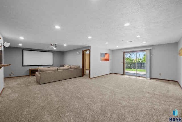 2305 N Ivy Rd, Tea, SD 57064 - home theater room featuring baseboards, carpet flooring, recessed lighting, and a textured ceiling