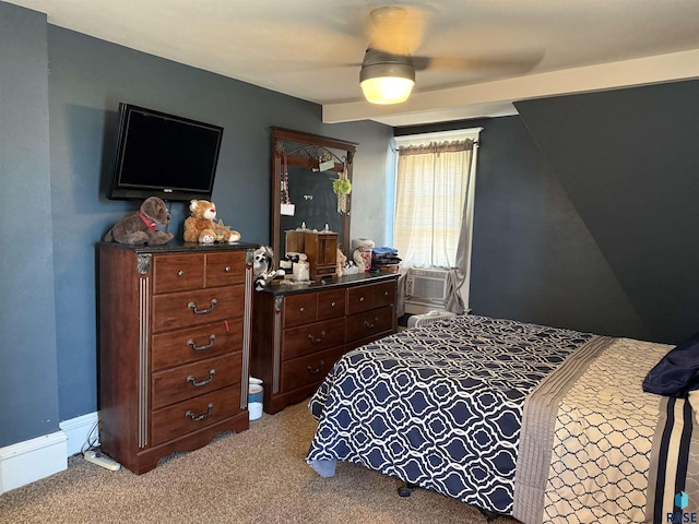 carpeted bedroom featuring ceiling fan and cooling unit