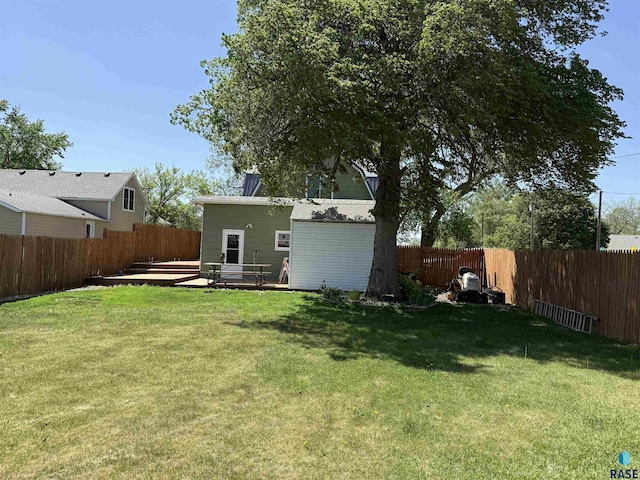 view of yard featuring a wooden deck