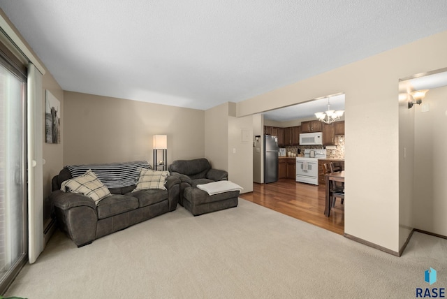 3600 S Gateway Blvd Unit 201, Sioux Falls, SD 57106 - living area featuring carpet floors and a chandelier