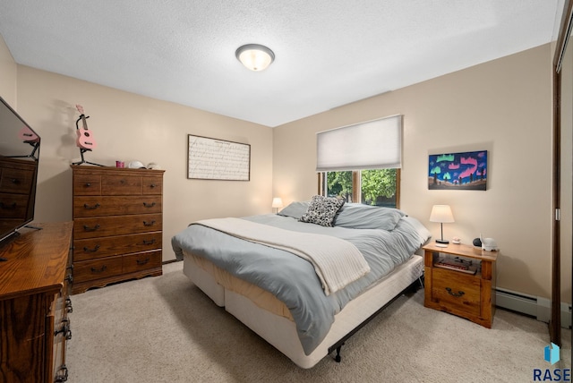 3600 S Gateway Blvd Unit 201, Sioux Falls, SD 57106 - bedroom featuring carpet and a baseboard heating unit