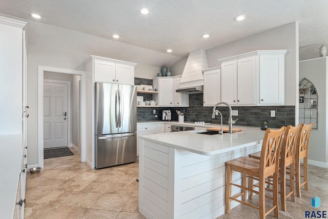 46370 237th St, Wentworth, SD 57075 - kitchen with freestanding refrigerator, a sink, open shelves, tasteful backsplash, and recessed lighting