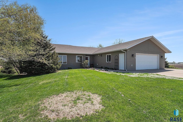 46370 237th St, Wentworth, SD 57075 - ranch-style home with an attached garage, driveway, and a front yard