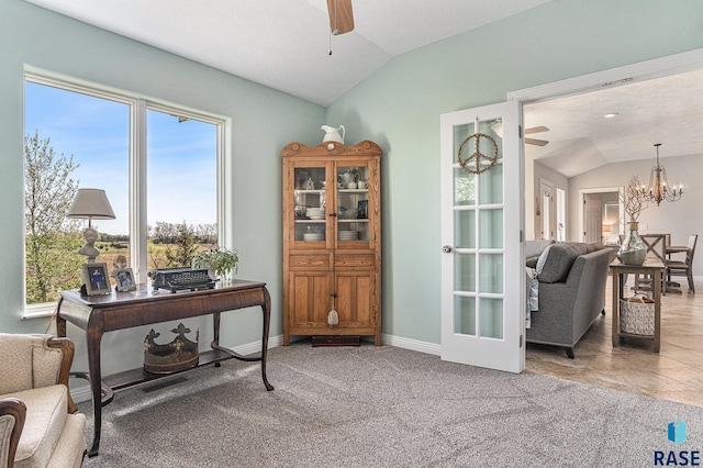 46370 237th St, Wentworth, SD 57075 - doorway with a ceiling fan, vaulted ceiling, a chandelier, baseboards, and carpet