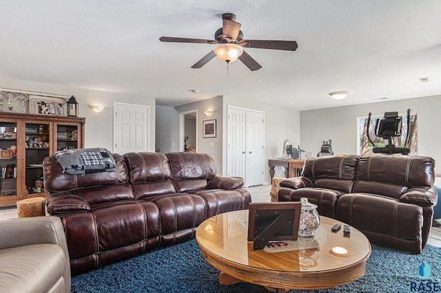 46370 237th St, Wentworth, SD 57075 - living room featuring a ceiling fan and light carpet
