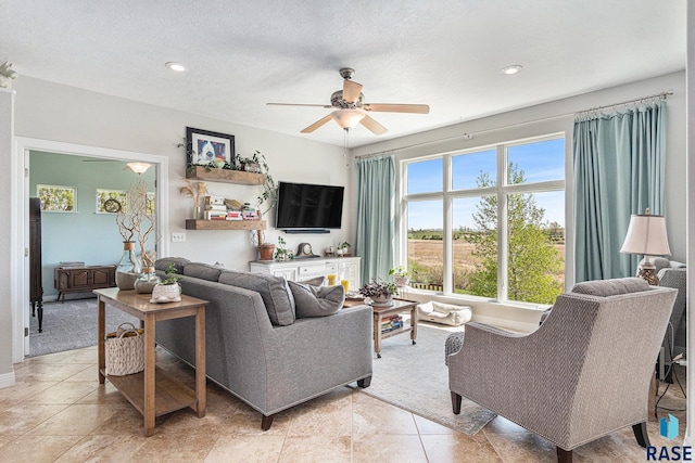 46370 237th St, Wentworth, SD 57075 - living area with a ceiling fan, recessed lighting, and light tile patterned floors
