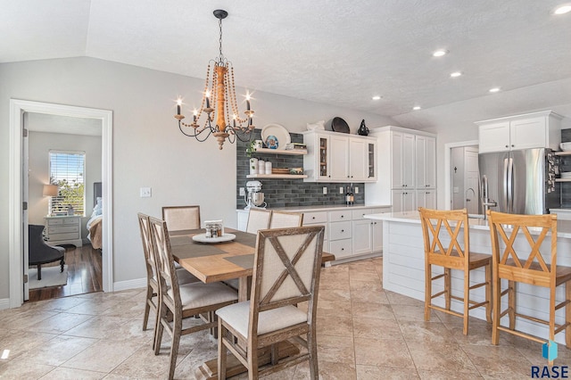 46370 237th St, Wentworth, SD 57075 - dining space with vaulted ceiling, a chandelier, baseboards, recessed lighting, and a textured ceiling