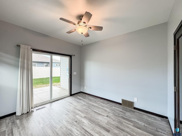8612 W Dalton St, Sioux Falls, SD 57106 - unfurnished room featuring light wood-style floors, a ceiling fan, and baseboards