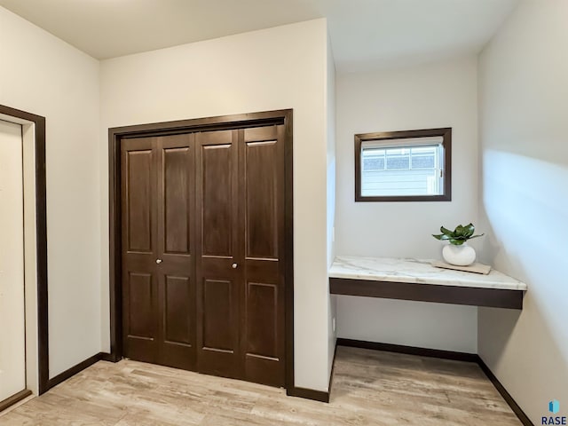 8612 W Dalton St, Sioux Falls, SD 57106 - unfurnished bedroom with light wood finished floors, baseboards, and a closet