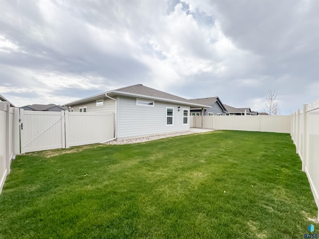 8612 W Dalton St, Sioux Falls, SD 57106 - rear view of property with a gate