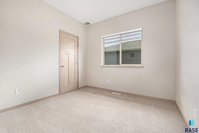 2629 S Richie Dr, Sioux Falls, SD 57106 - unfurnished room with light carpet and baseboards