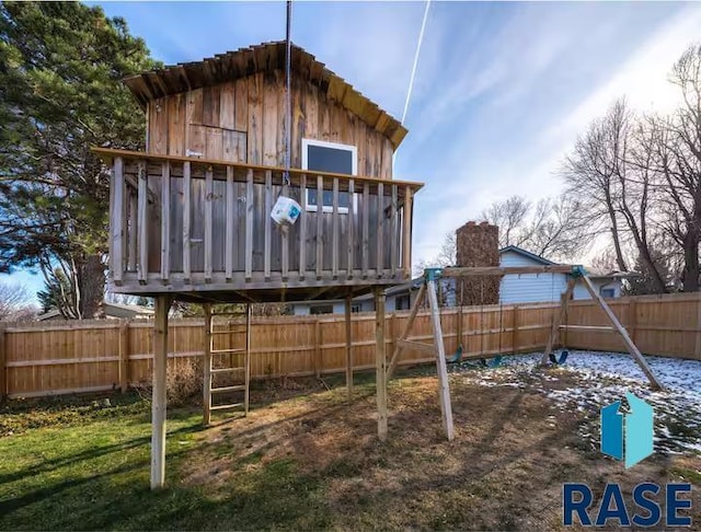 2304 S Mockingbird Cir, Sioux Falls, SD 57103 - view of jungle gym with a fenced backyard and a wooden deck