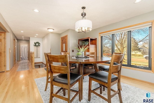 408 N Oak Ridge Rd, Brandon, SD 57005 - dining space featuring light wood-style floors, recessed lighting, baseboards, and a chandelier