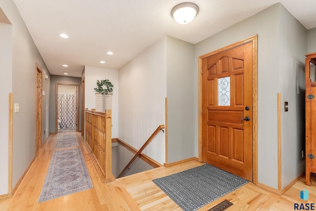 408 N Oak Ridge Rd, Brandon, SD 57005 - entryway featuring light wood-style floors, baseboards, and recessed lighting