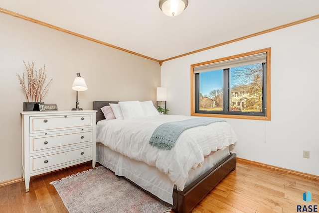 408 N Oak Ridge Rd, Brandon, SD 57005 - bedroom featuring hardwood / wood-style floors, ornamental molding, and baseboards