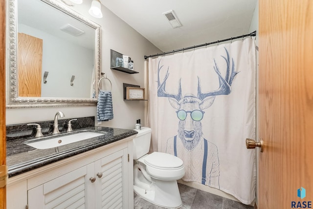 408 N Oak Ridge Rd, Brandon, SD 57005 - full bath featuring toilet, vanity, tile patterned floors, and a shower with curtain