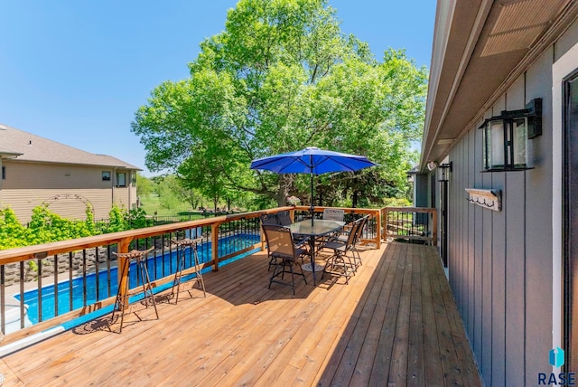 408 N Oak Ridge Rd, Brandon, SD 57005 - wooden terrace with outdoor dining space