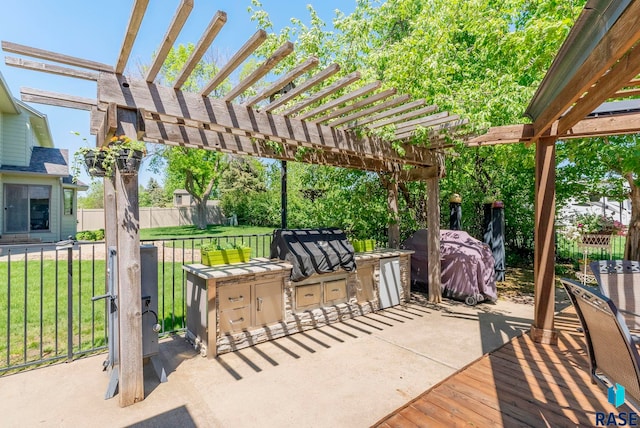 408 N Oak Ridge Rd, Brandon, SD 57005 - view of patio / terrace with an outdoor kitchen, a pergola, and a grill