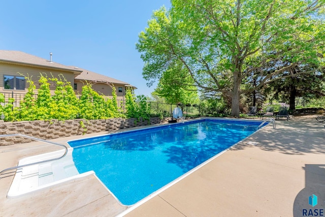 408 N Oak Ridge Rd, Brandon, SD 57005 - view of pool featuring a patio and fence