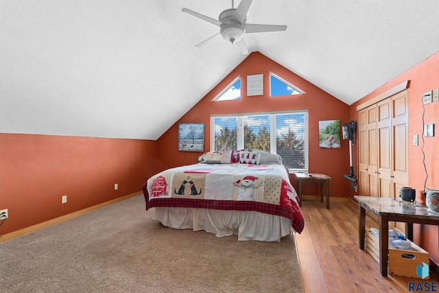 31780 476th Ave, Elk Point, SD 57025 - bedroom with lofted ceiling, ceiling fan, baseboards, and light wood finished floors