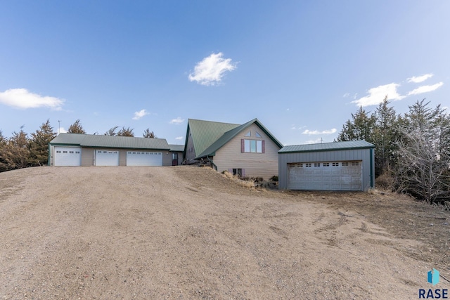 31780 476th Ave, Elk Point, SD 57025 - view of front of property featuring a garage and metal roof