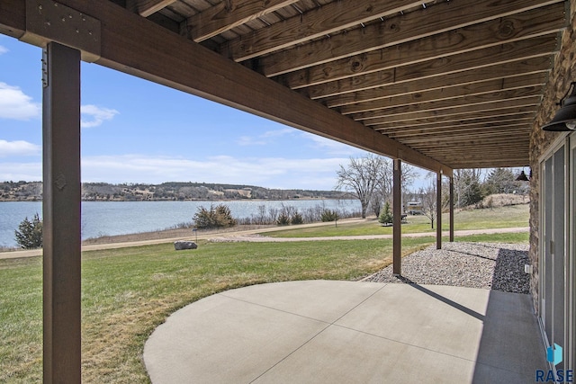 view of patio / terrace featuring a water view