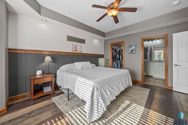 2320 N Ivy Rd, Tea, SD 57064 - bedroom with wood finished floors, a spacious closet, a closet, a sink, and recessed lighting