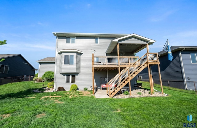 2320 N Ivy Rd, Tea, SD 57064 - rear view of house with a wooden deck and stairs