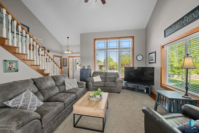 2320 N Ivy Rd, Tea, SD 57064 - living room featuring plenty of natural light, high vaulted ceiling, carpet, stairway, and a ceiling fan