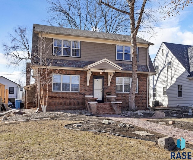 705 E 21st St, Sioux Falls, SD 57105 - view of front of property with central air condition unit and brick siding