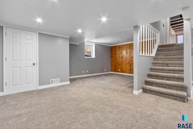 705 E 21st St, Sioux Falls, SD 57105 - below grade area with baseboards, carpet floors, stairs, and recessed lighting