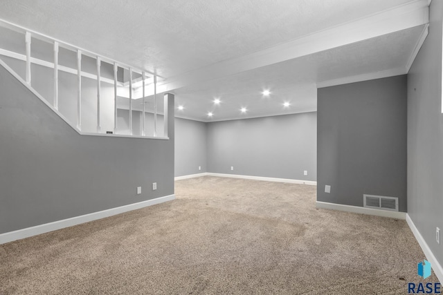 705 E 21st St, Sioux Falls, SD 57105 - finished basement with carpet, recessed lighting, crown molding, and baseboards