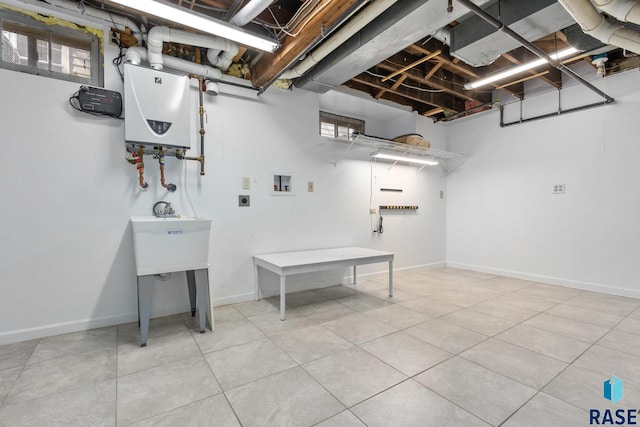 705 E 21st St, Sioux Falls, SD 57105 - below grade area featuring water heater and tile patterned floors