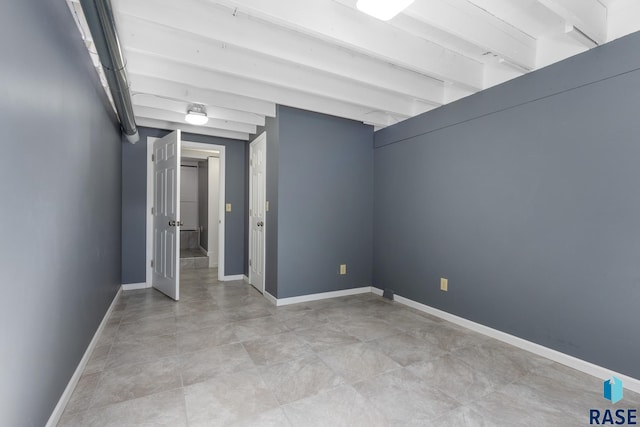 705 E 21st St, Sioux Falls, SD 57105 - spare room featuring baseboards
