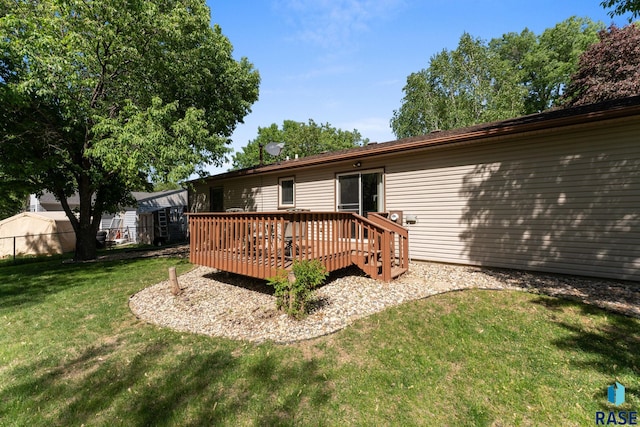 back of property with a deck