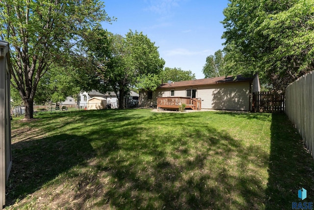 view of yard with a deck