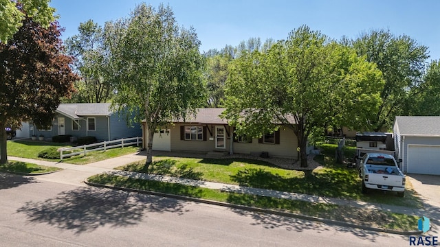 view of front of house with concrete driveway and an attached garage